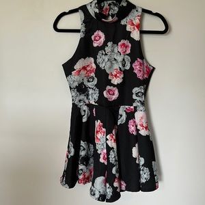 Floral high neck romper with an open back